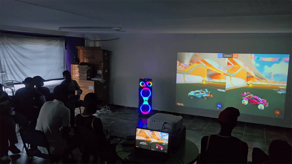 Young people playing Rocket League at a Gamzic community match